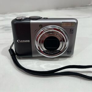 Canon Silver and Black Digital Camera for repair